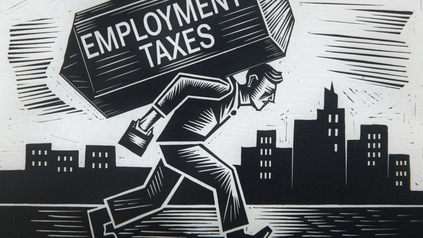 A small business owner carrying a heavy load of employment taxes.