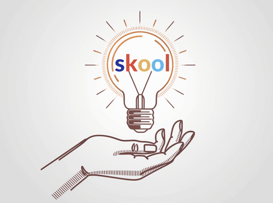 A hand offering a glowing lightbulb with "Skool" embedded in it.